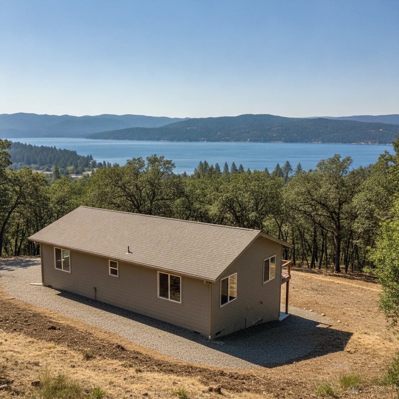 Wildfire-hardened home, Clearlake CA Non-combustible fiber cement siding on a hillside home above Clear Lake in Clearlake California
